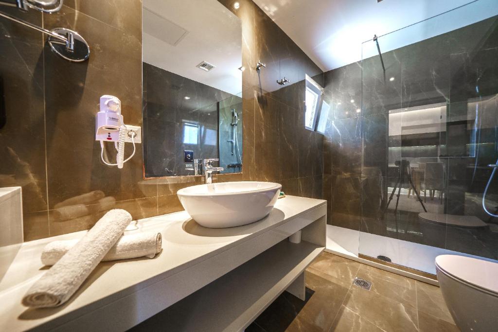 Koupelna v ubytování Elysian Suites