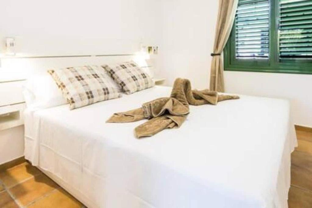 Postel nebo postele na pokoji v ubytování Casa Solazo