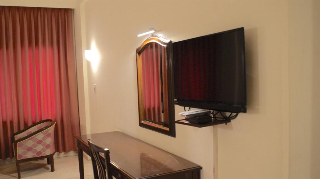 TV a/nebo společenská místnost v ubytování Hotel Alpana