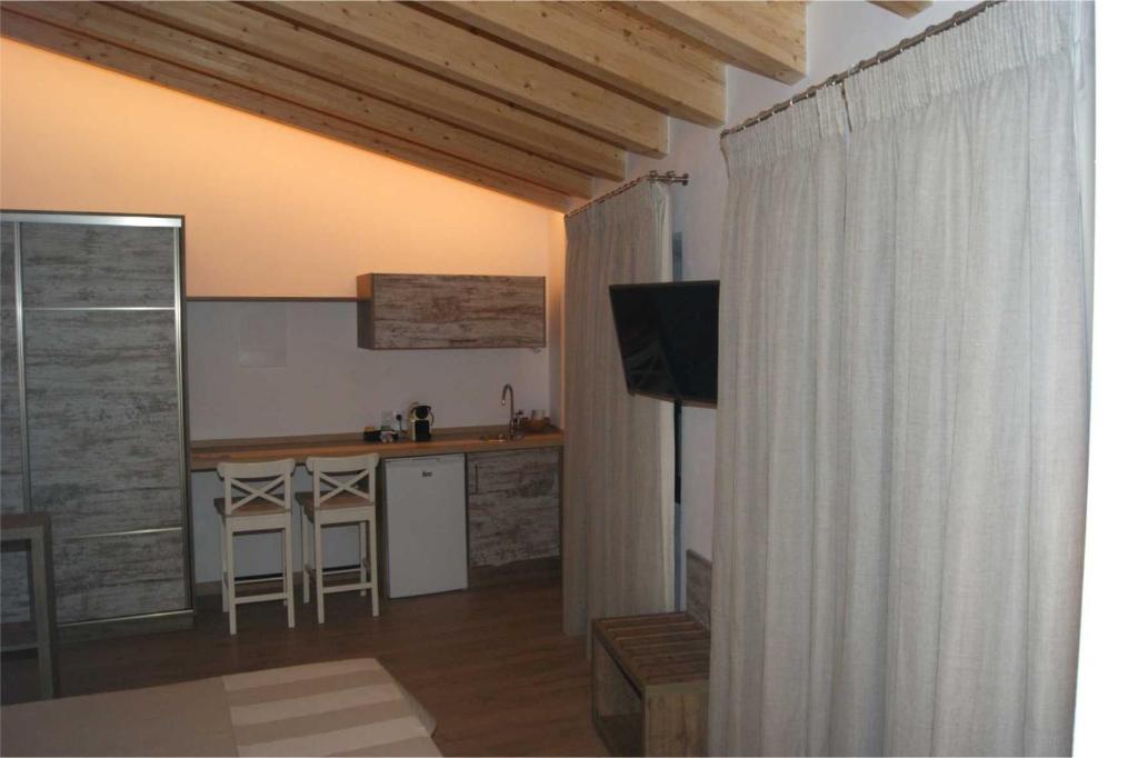 Kuchyň nebo kuchyňský kout v ubytování Petit Hotel C'an Mel