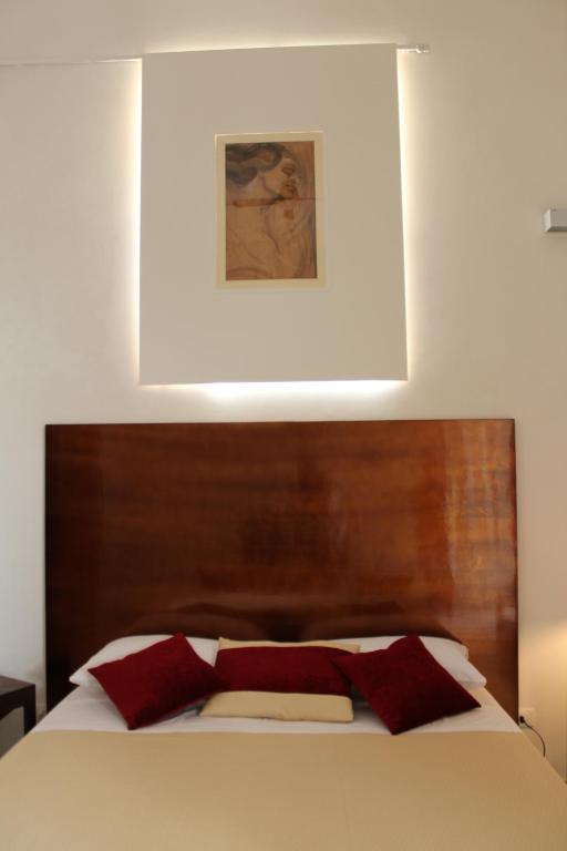 Postel nebo postele na pokoji v ubytování Casa Marsalia