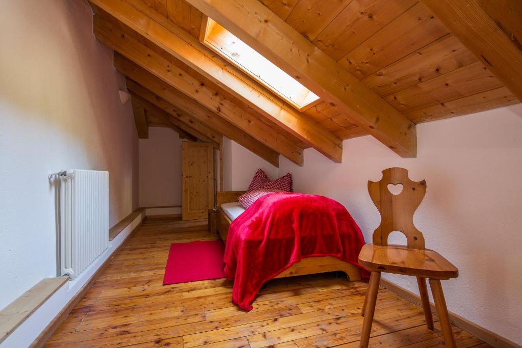 Postel nebo postele na pokoji v ubytování Stelvio Residence