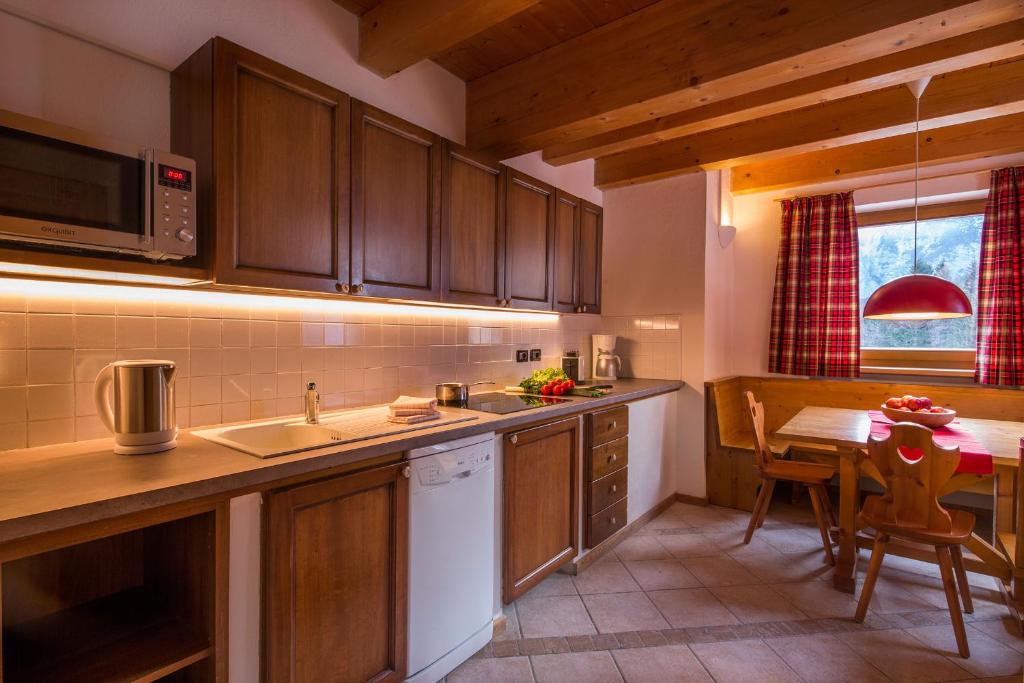 Kuchyň nebo kuchyňský kout v ubytování Stelvio Residence