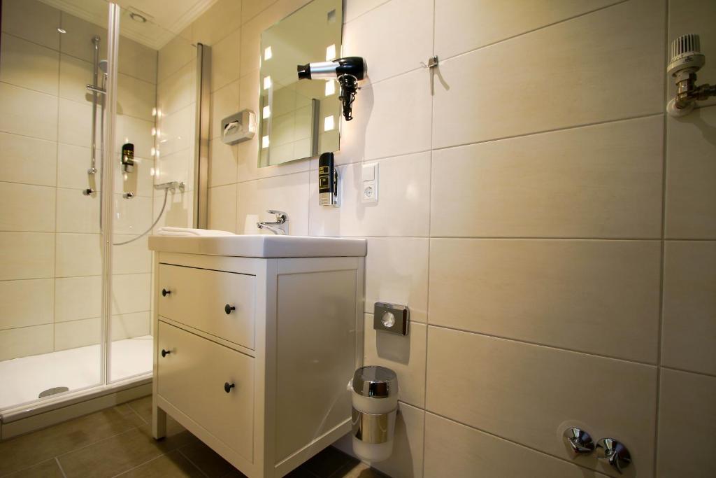 Koupelna v ubytování Hotel Schneider
