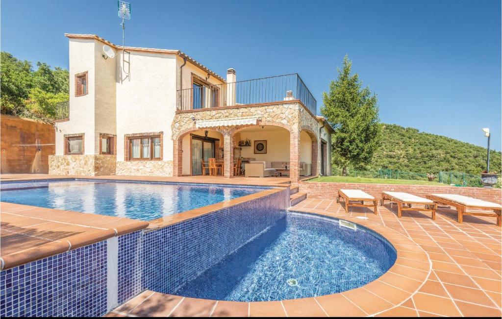The swimming pool at or close to Beautiful Home In Sant Miquel Daro