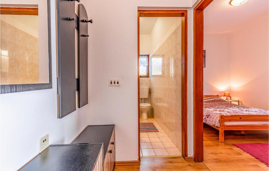 Posteľ alebo postele v izbe v ubytovaní Lovely Apartment In Pula With Kitchen