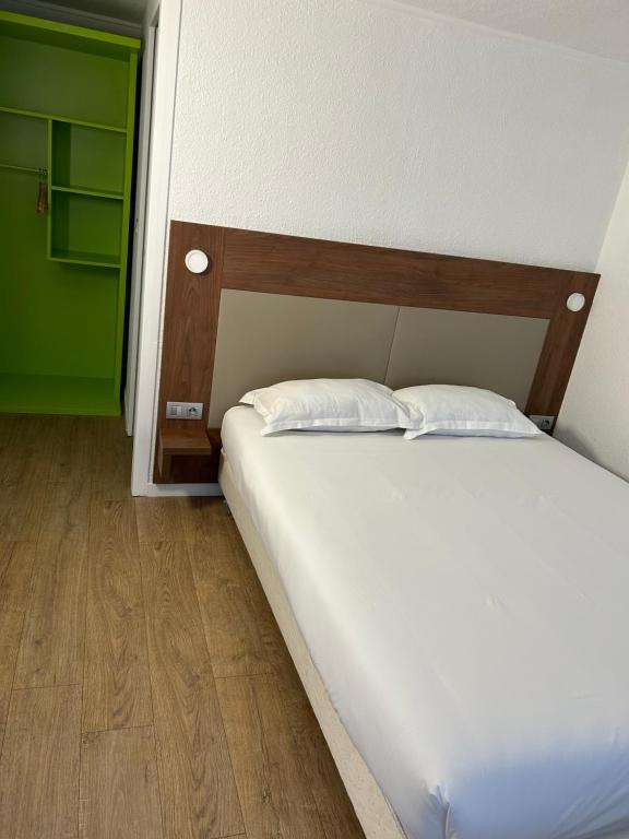 Postel nebo postele na pokoji v ubytování Kyriad Direct Metz Nord – Woippy