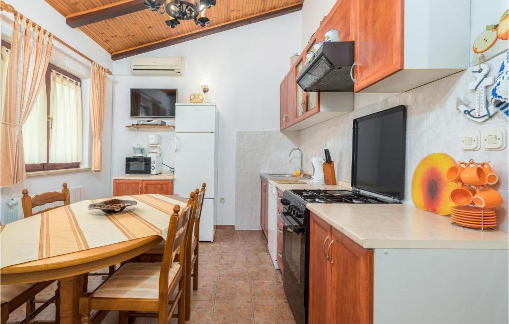 Kuchyň nebo kuchyňský kout v ubytování Holiday Home Fazana 22
