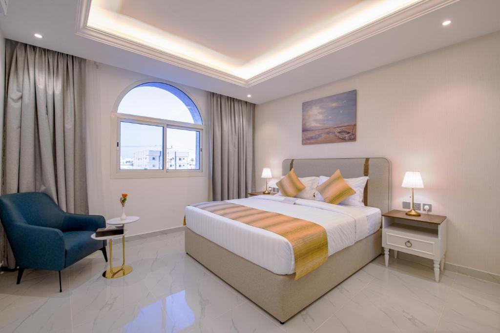 Postel nebo postele na pokoji v ubytování Neema Hotel Al Wajh