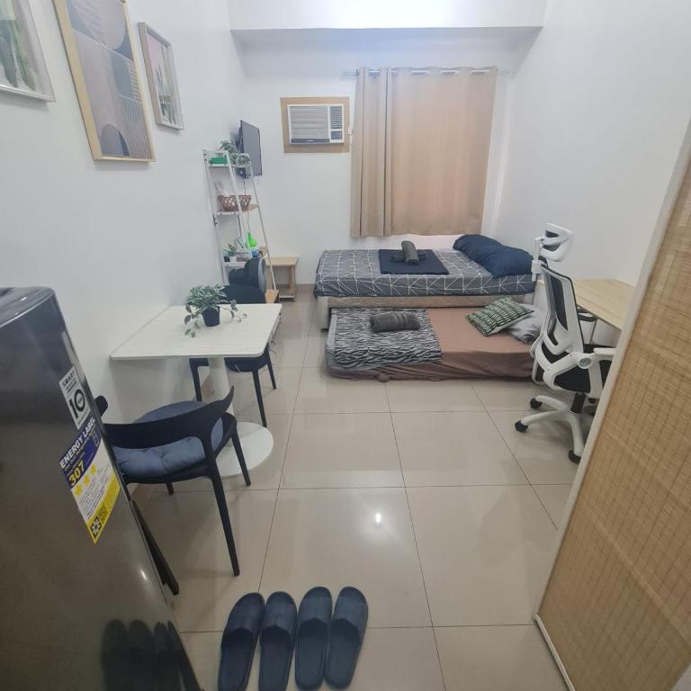 Fotografie z fotogalerie ubytování Homely - SMDC Green 2 Residences, Dasmarinas City v destinaci Pasong Bayog