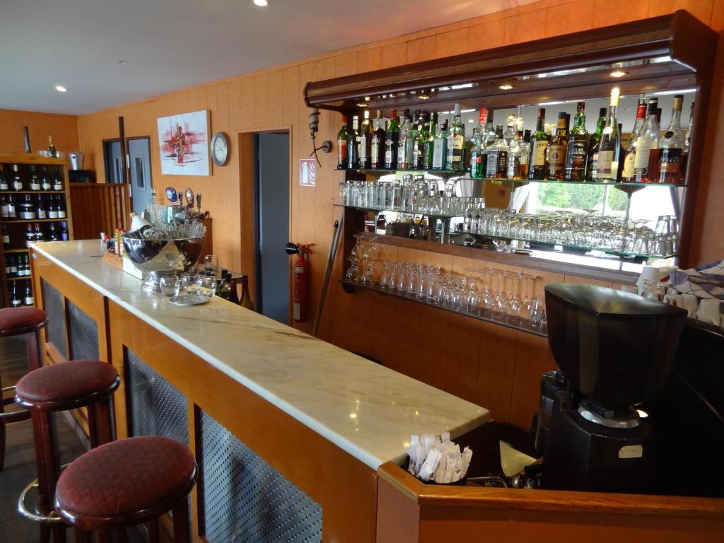 Lounge nebo bar v ubytování Hôtel Le Forestia