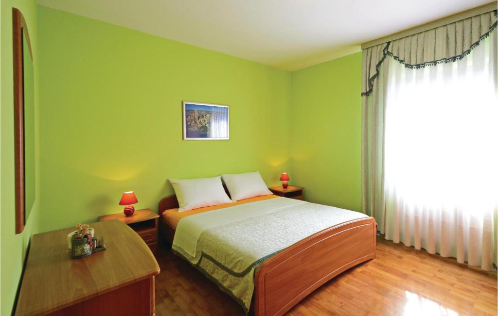 Posteľ alebo postele v izbe v ubytovaní Holiday Home Labin Presika Ii