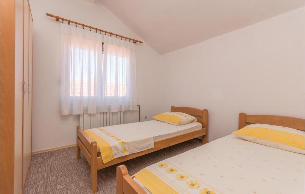 Posteľ alebo postele v izbe v ubytovaní Apartment Zadar 05