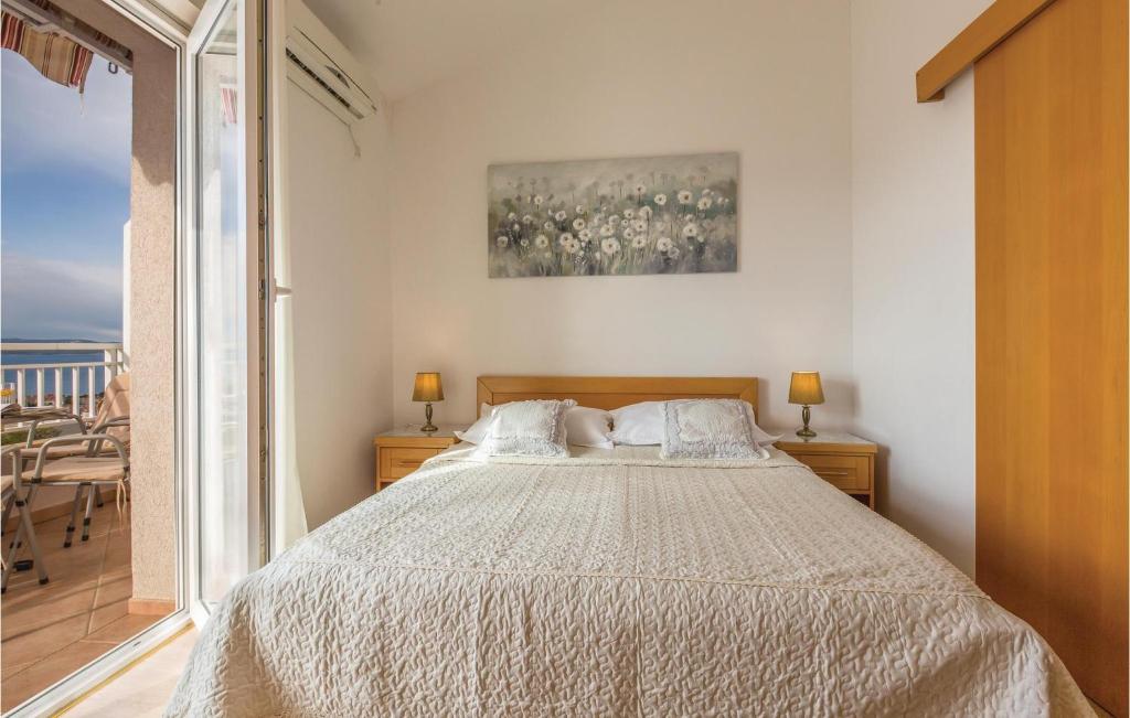 Posteľ alebo postele v izbe v ubytovaní Apartment Vukovarska Ix