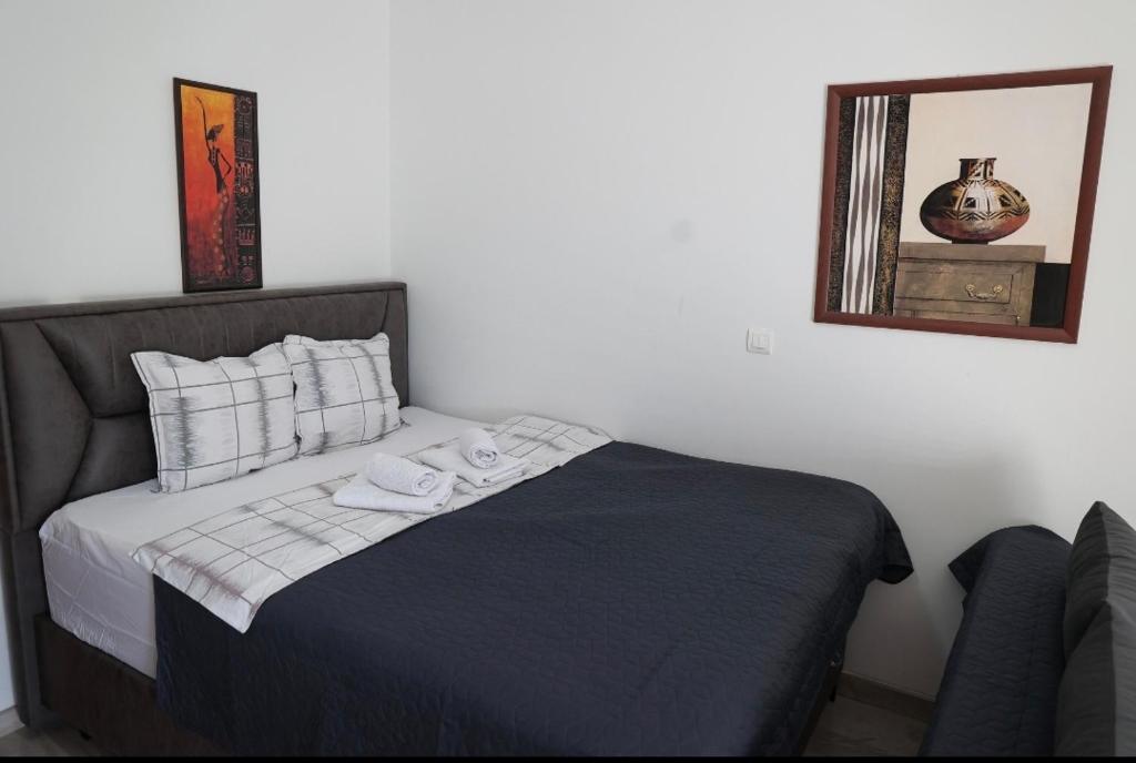 En eller flere senger på et rom på Apartman Iva