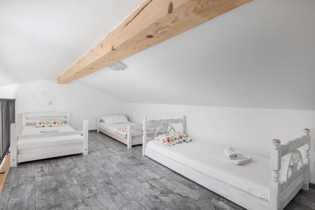 Posteľ alebo postele v izbe v ubytovaní Villa Vuka