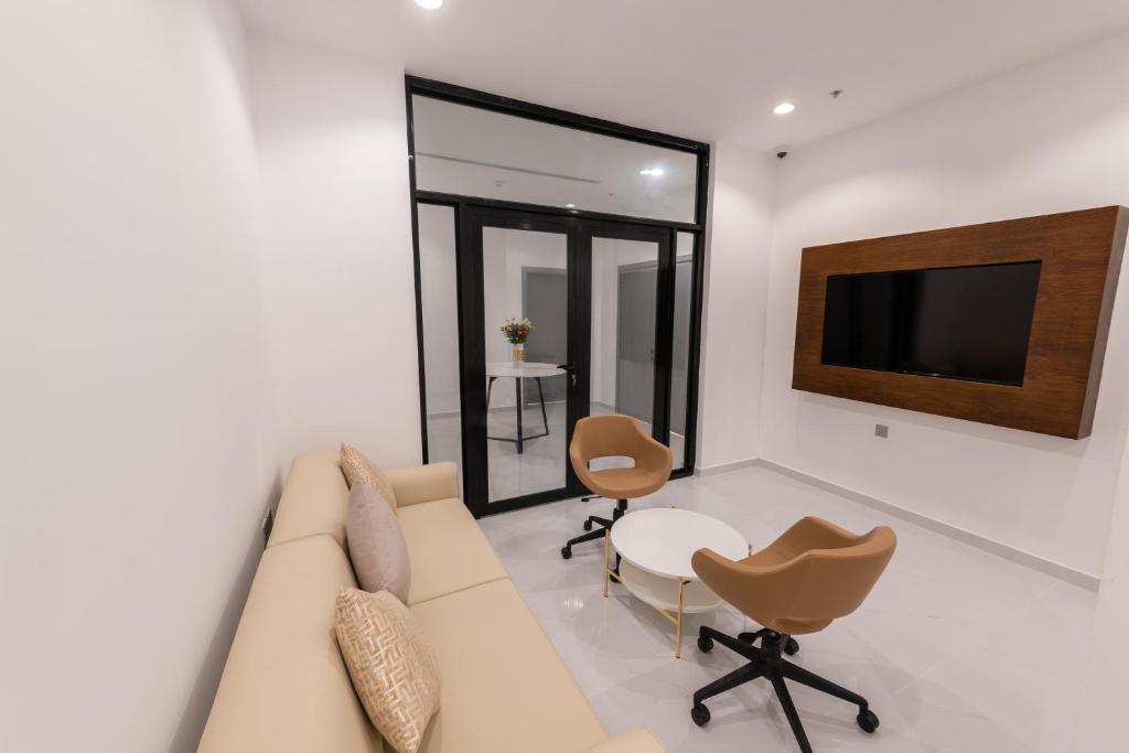 TV a/nebo společenská místnost v ubytování Neema Hotel Al Wajh