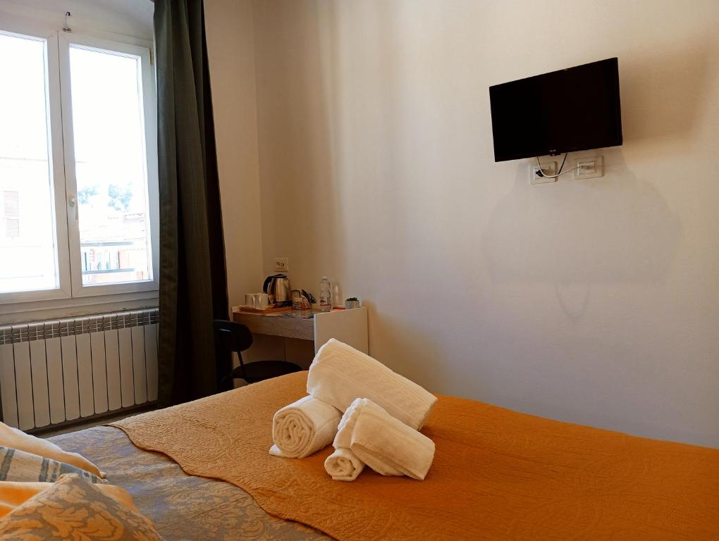 TV a/nebo společenská místnost v ubytování Al molo 21