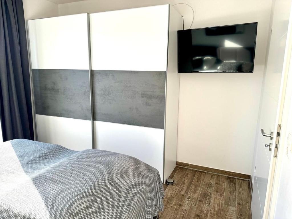Postel nebo postele na pokoji v ubytování Küstenglück