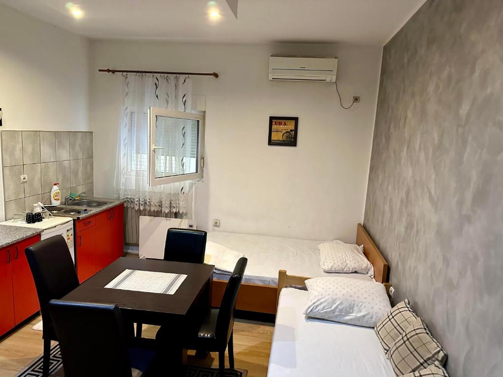 Postel nebo postele na pokoji v ubytování Apartments Agape