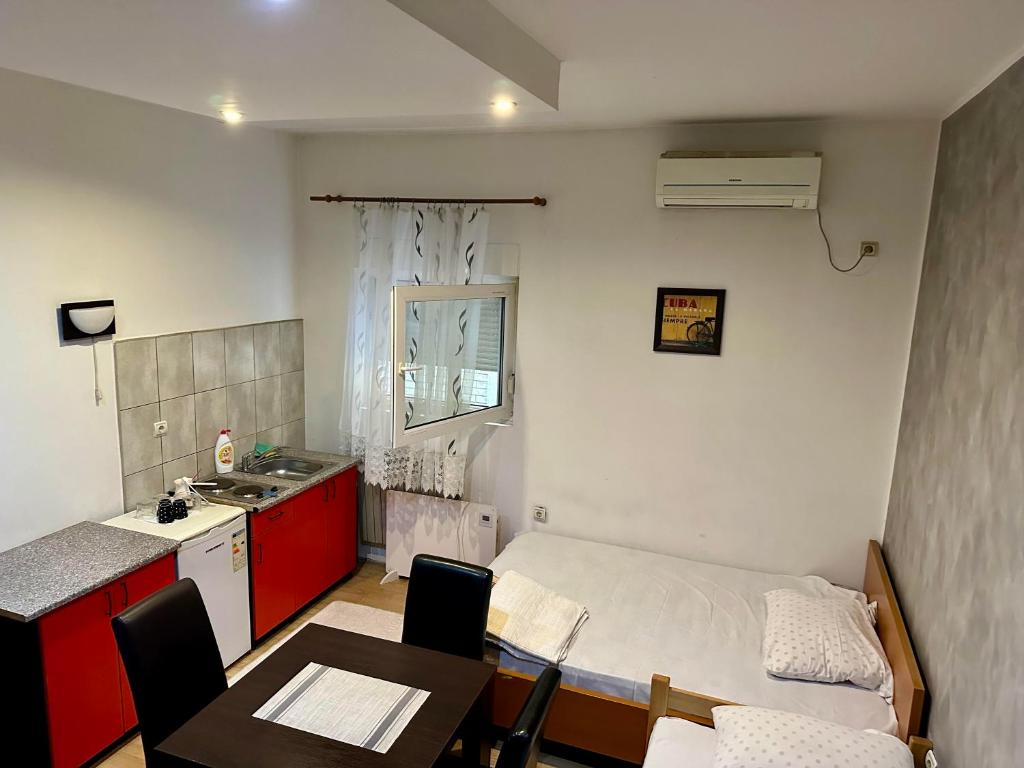 Postel nebo postele na pokoji v ubytování Apartments Agape