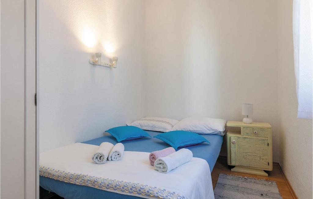 Postel nebo postele na pokoji v ubytování Holiday Home Grljevacka Vi