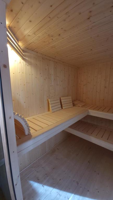 Postel nebo postele na pokoji v ubytování Holztraum Chalet mit Sauna