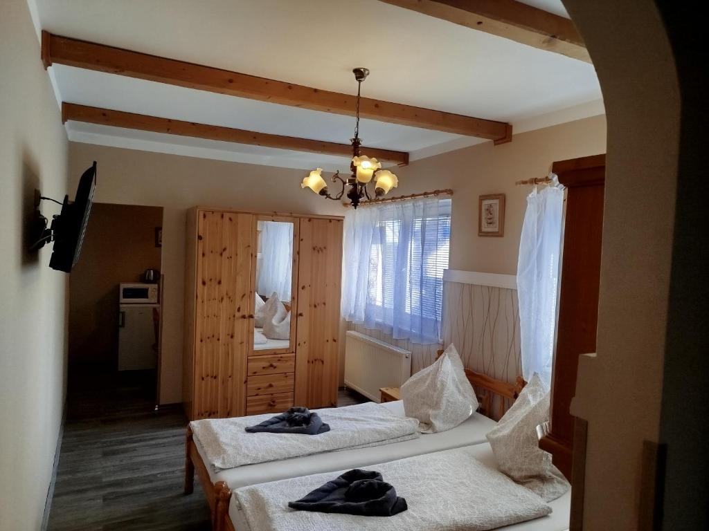 Postel nebo postele na pokoji v ubytování Penzion Žírovice