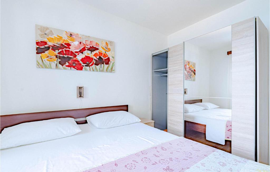Postel nebo postele na pokoji v ubytování Holiday Home Prigradica Bb Cr