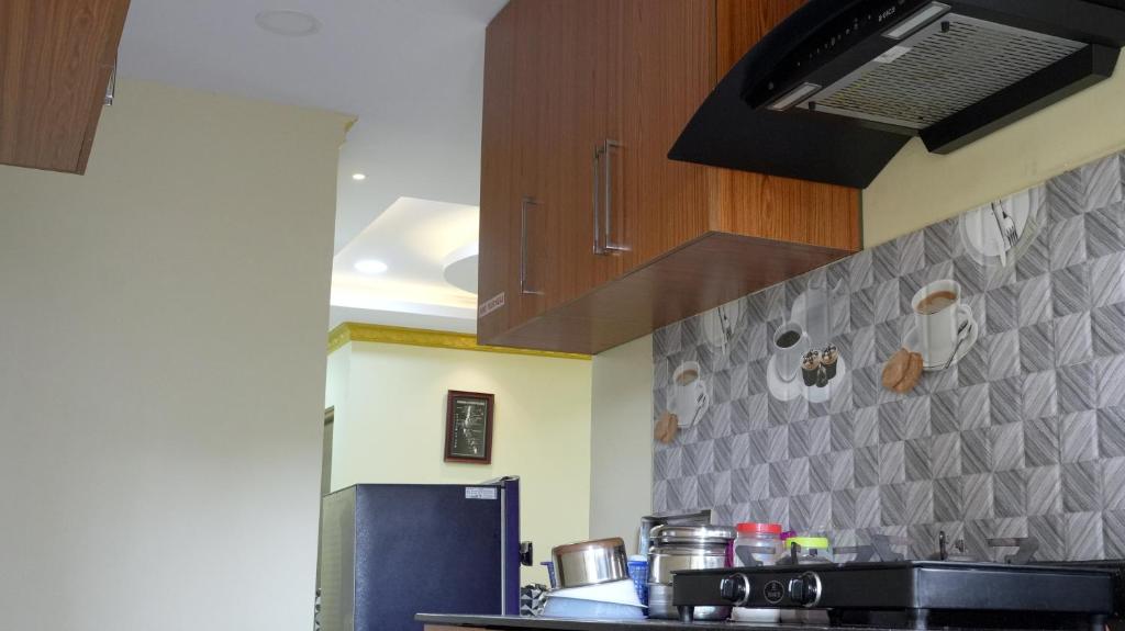 Kuchyň nebo kuchyňský kout v ubytování Haven Garden Homestay