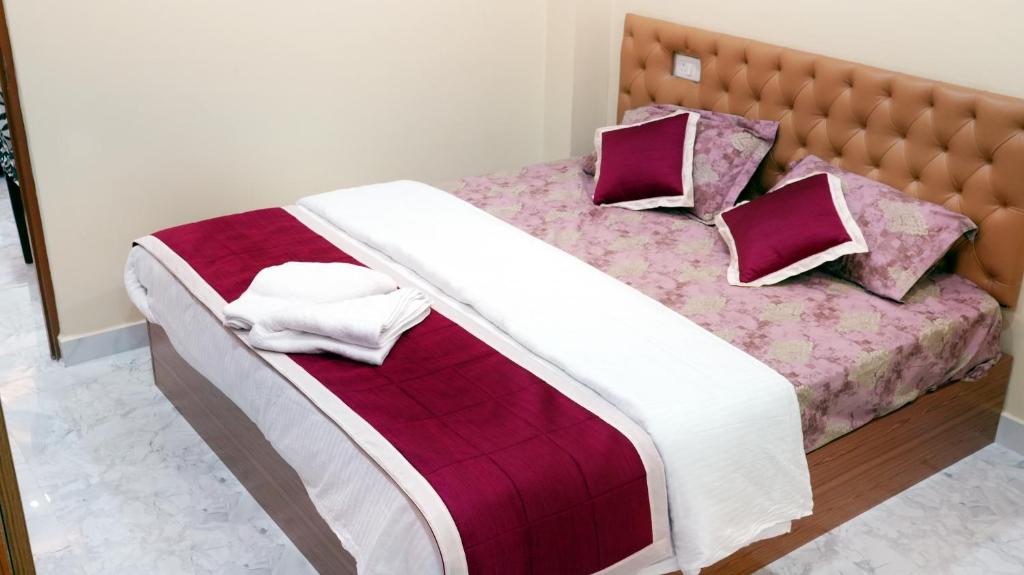 Postel nebo postele na pokoji v ubytování Haven Garden Homestay