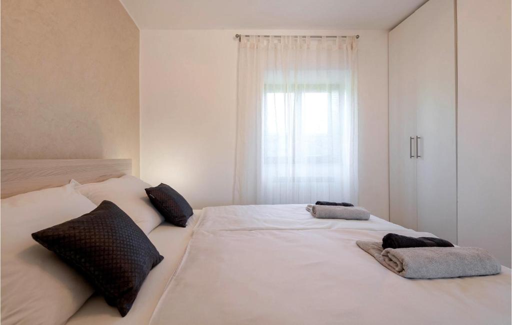 Posteľ alebo postele v izbe v ubytovaní Cozy Home In Labin With Wifi