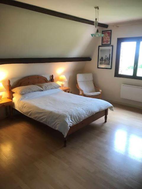 Postel nebo postele na pokoji v ubytování Chambre d'hôtes de Dompierre
