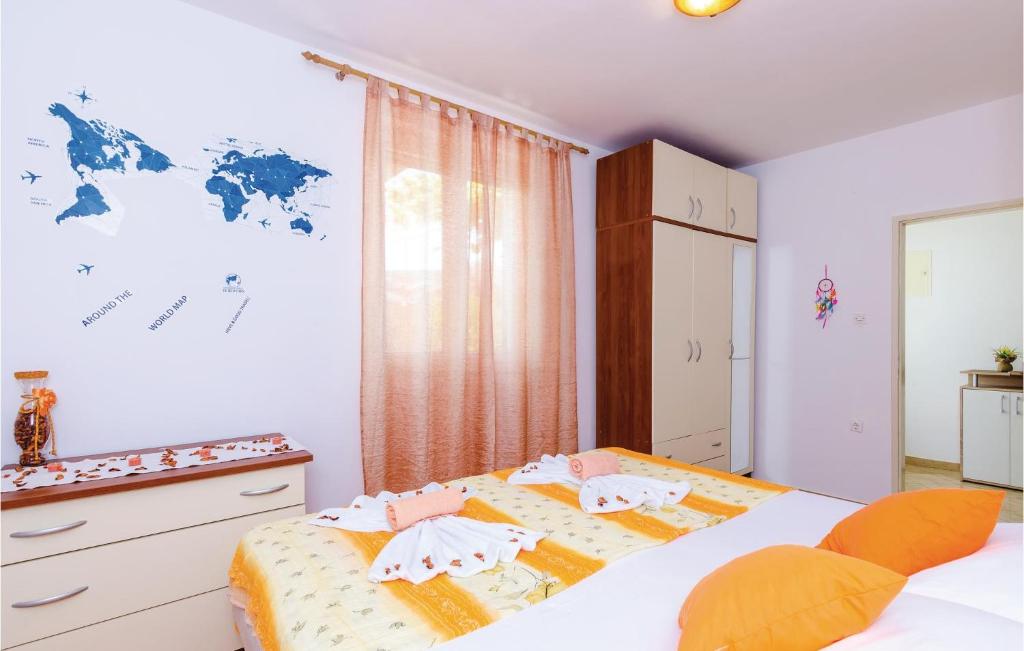 Posteľ alebo postele v izbe v ubytovaní Three-Bedroom Apartment In Slano