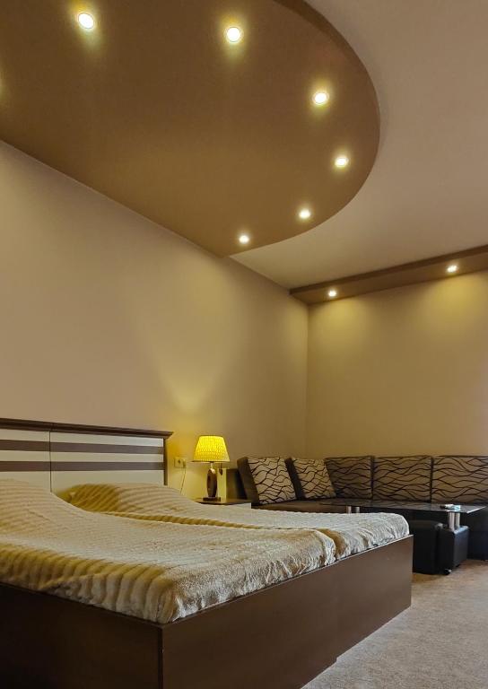 Postel nebo postele na pokoji v ubytování Areg Hotel
