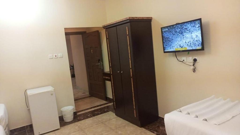 TV a/nebo společenská místnost v ubytování فندق أسما مكه التيسير