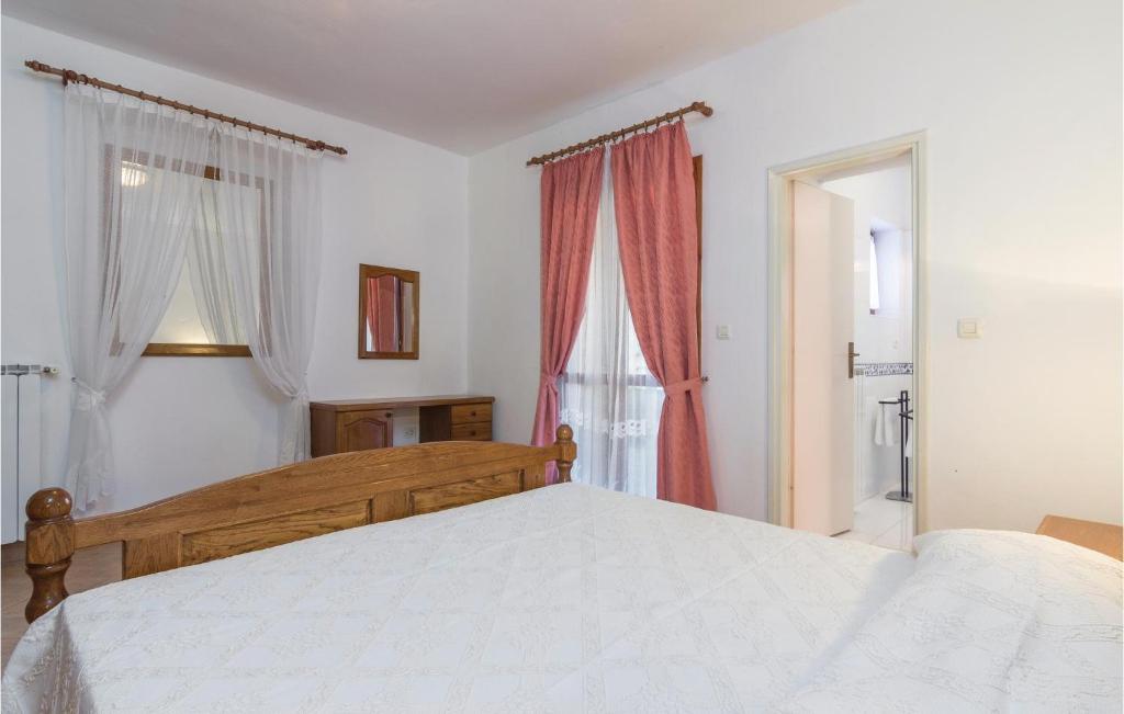 Posteľ alebo postele v izbe v ubytovaní Awesome Home In Rovinj