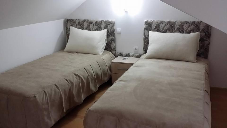 Ліжко або ліжка в номері Apartments Secer Sokak