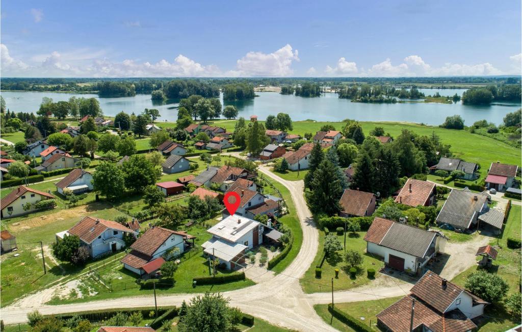 an aerial view of a residential estate next to a river at Stunning Home In Legrad With Sauna in Legrad