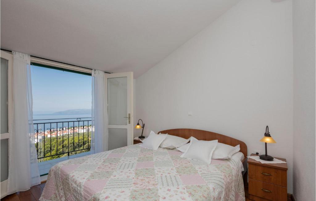 Postel nebo postele na pokoji v ubytování Holiday Home Makarska Puharici