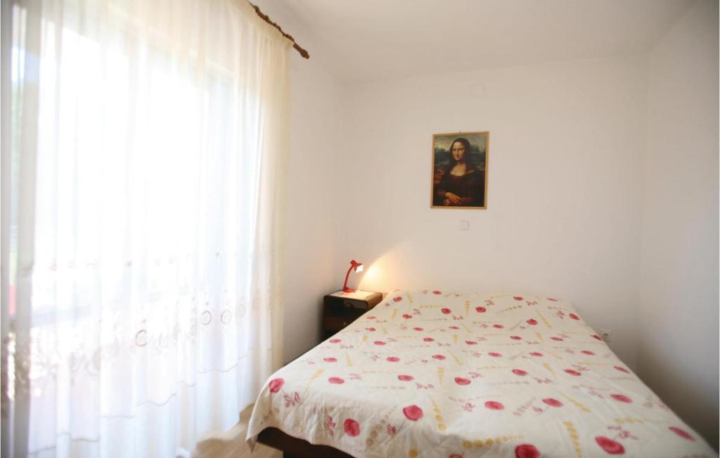 Posteľ alebo postele v izbe v ubytovaní Apartment Labin Kapelica Ii