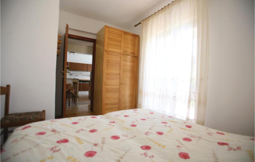 Posteľ alebo postele v izbe v ubytovaní Apartment Labin Kapelica Ii