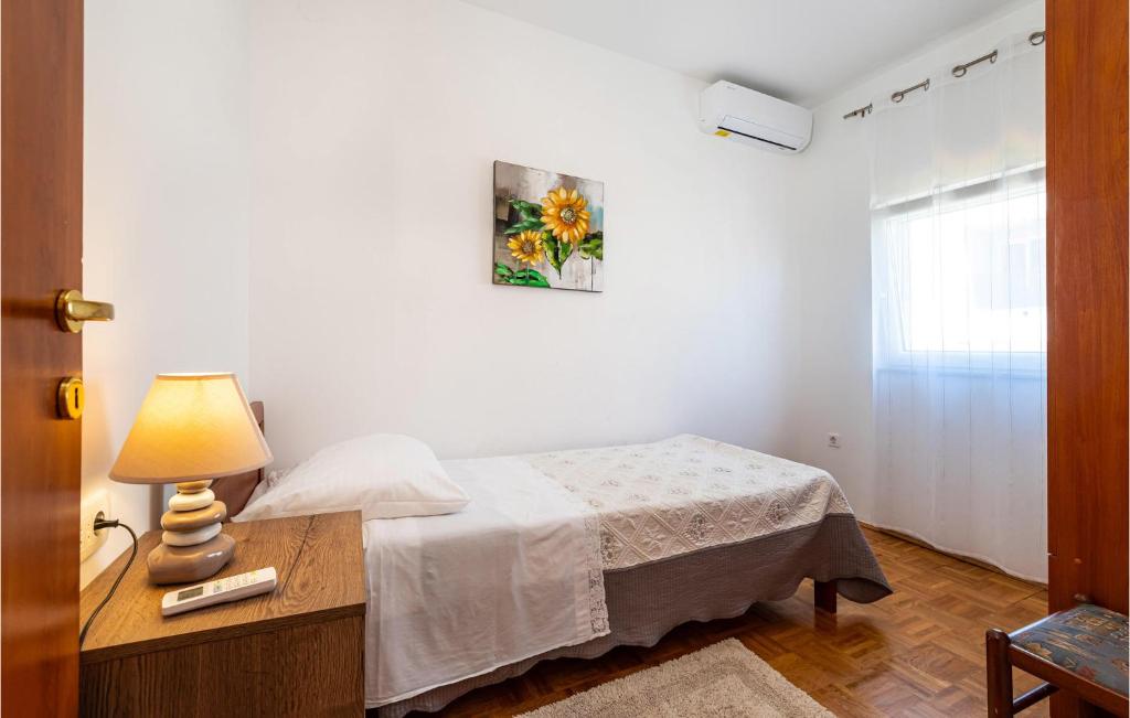Postel nebo postele na pokoji v ubytování Holiday Home Ul,19-20 Br, Iv