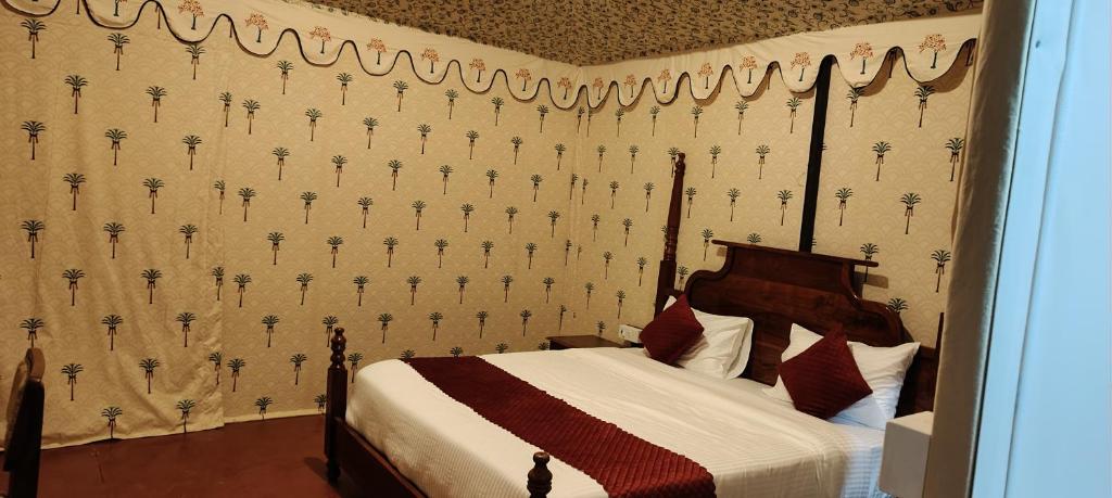 Postel nebo postele na pokoji v ubytování Braham Vatika Resort