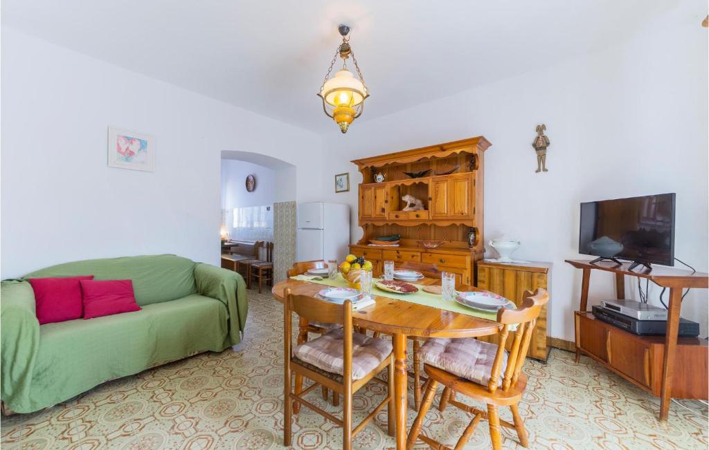 Televízia a/alebo spoločenská miestnosť v ubytovaní Apartment Valtura 13