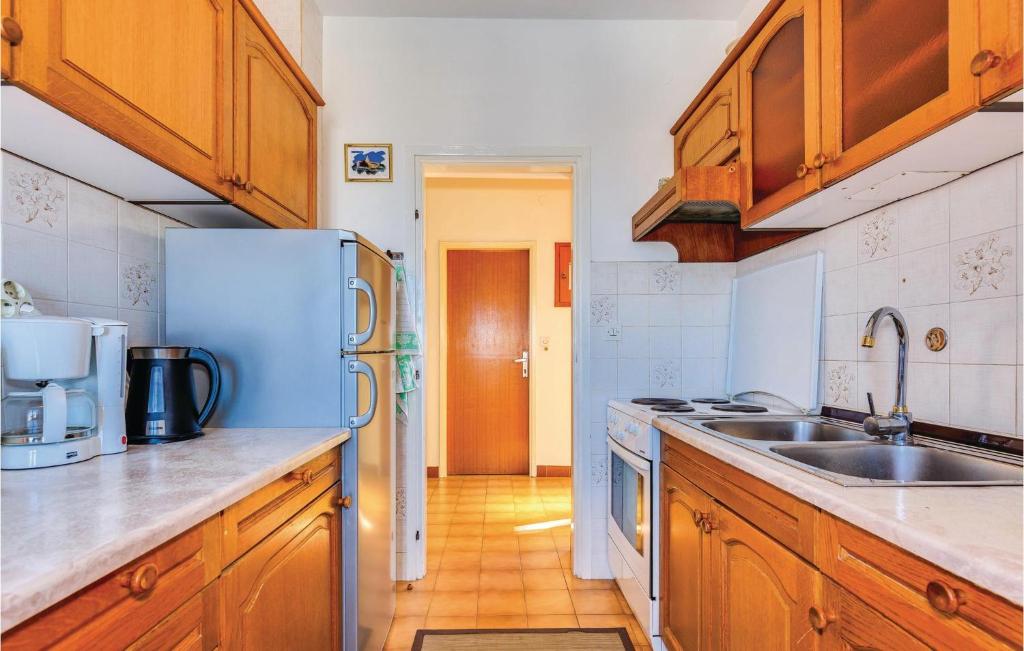 Kuchyň nebo kuchyňský kout v ubytování Nice Apartment In Crikvenica