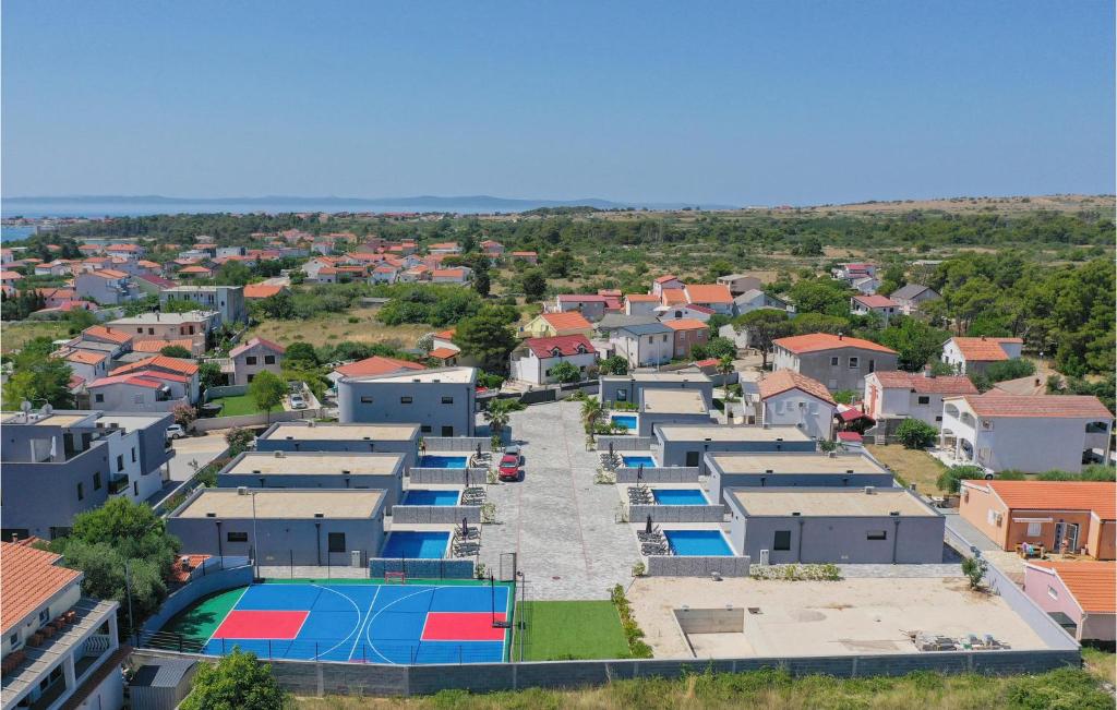 an aerial view of a residential neighbourhood with a pool at Awesome Home In Vir With Sauna in Vir