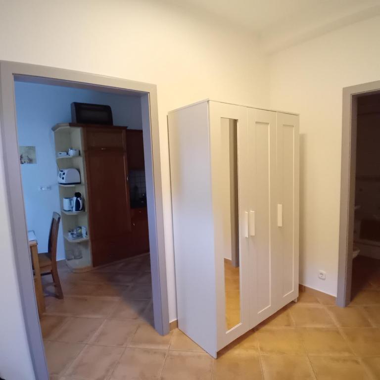 Kuchyň nebo kuchyňský kout v ubytování Kertész14 Apartman