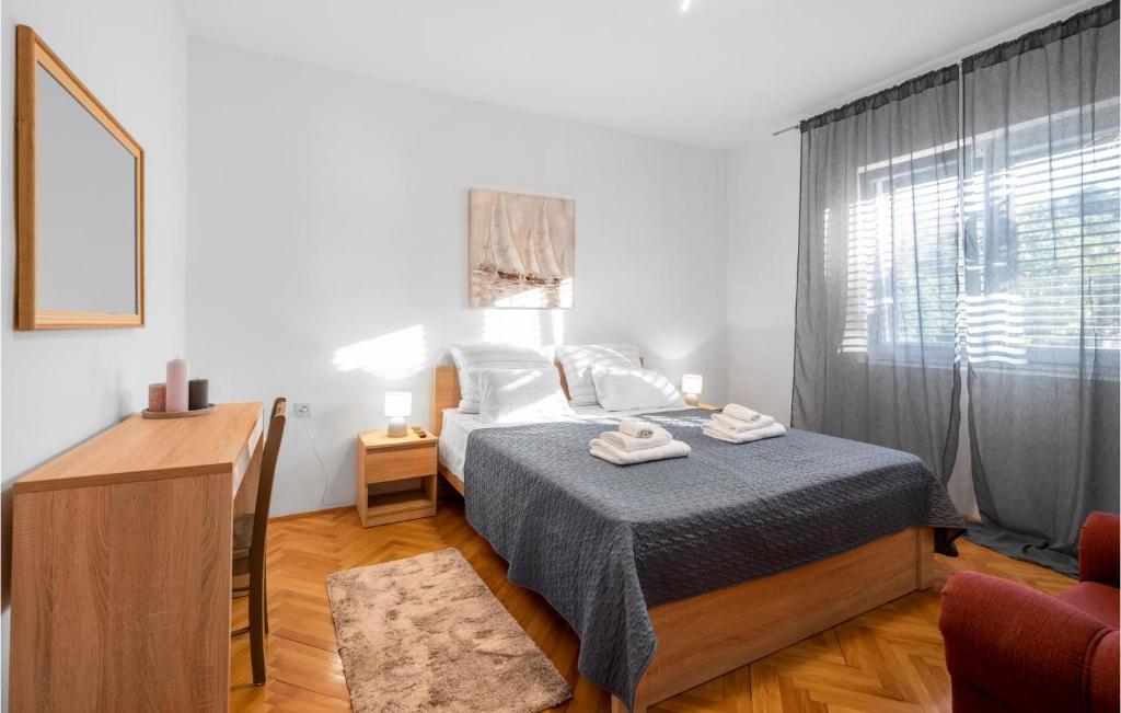 Posteľ alebo postele v izbe v ubytovaní 2 Bedroom Nice Home In Betina