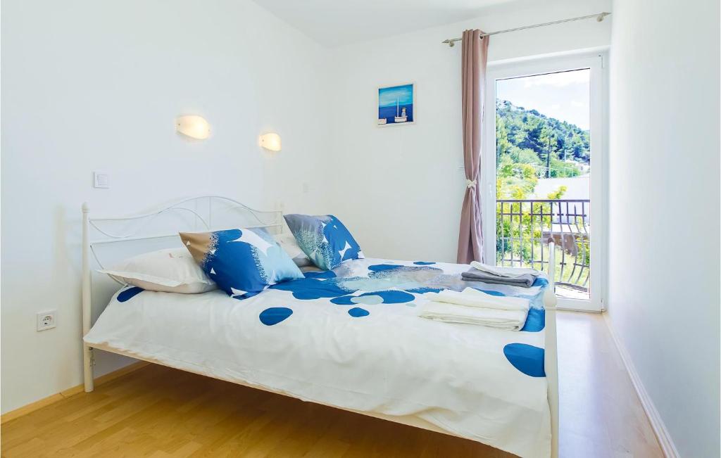 Posteľ alebo postele v izbe v ubytovaní Four-Bedroom Holiday Home In Pisak